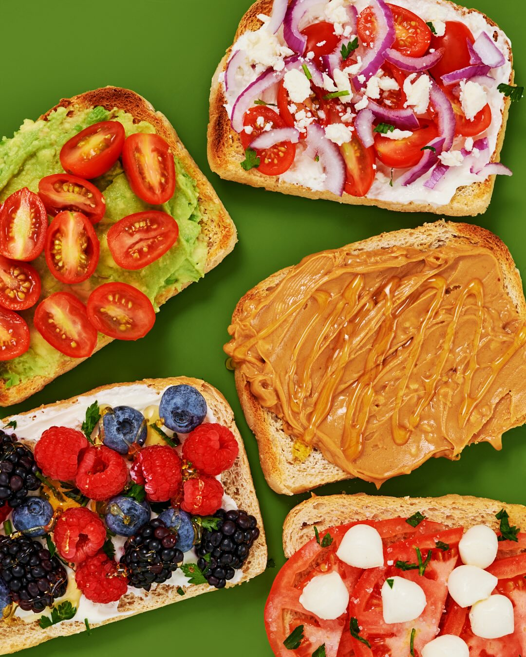 An assortment of spreads on toasted Rudi's bread